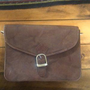 Purple leather clutch